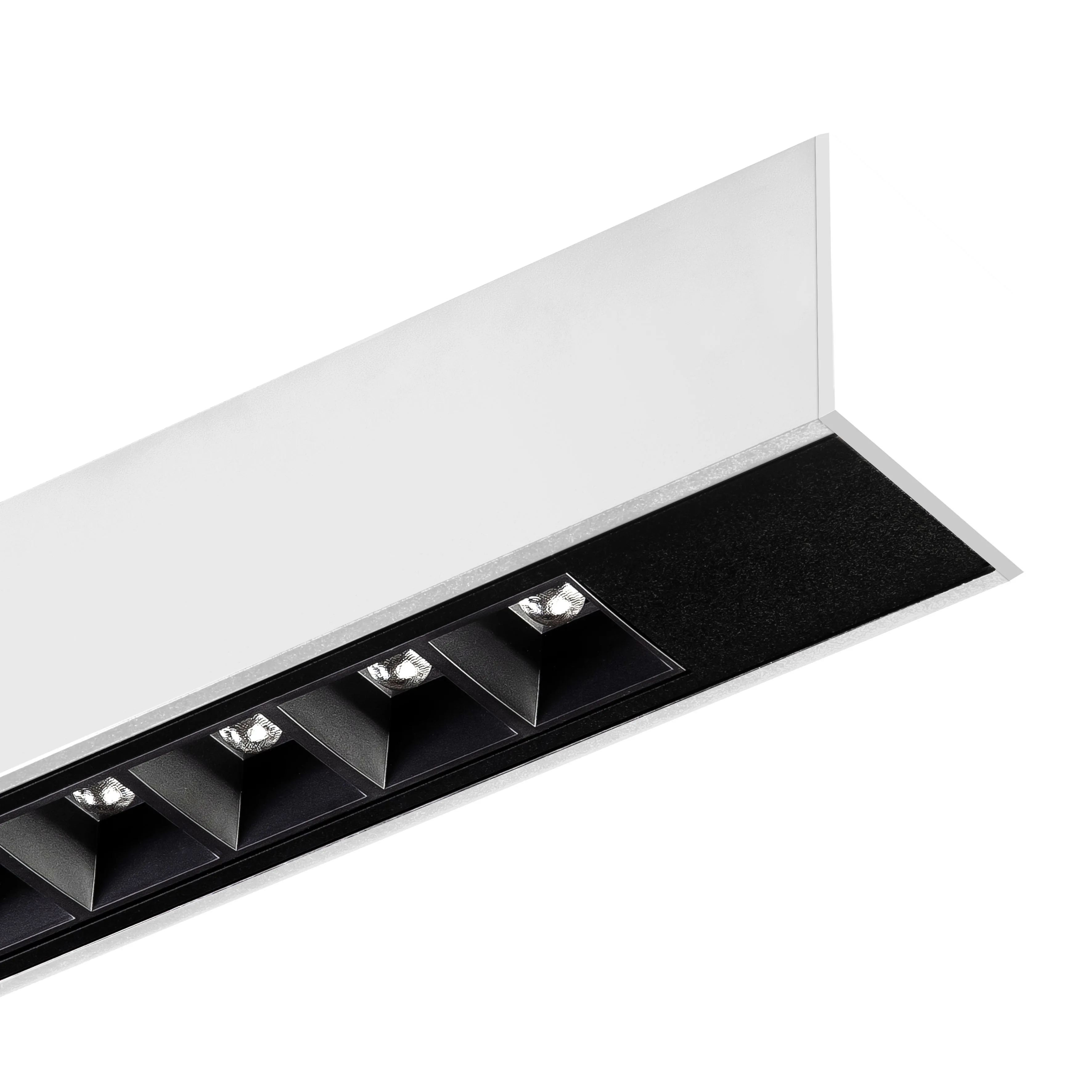 Luma with a RAL 9016 white body and matt black dark-light baffles