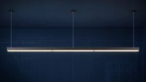 Single straight suspended continuous linear lighting run formed from three aligned modules